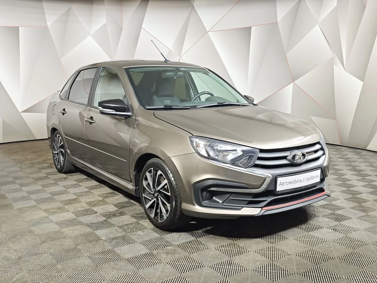 ВАЗ (Lada) Granta 1.6 MT FWD (118 л.с.) Enjoy Коричневый в АВИЛОН. Слайд №3