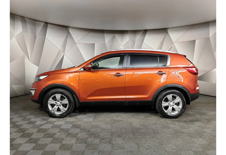 Kia Sportage 2.0 AT 4WD (142 л.с.) Оранжевый в АВИЛОН. Слайд №5