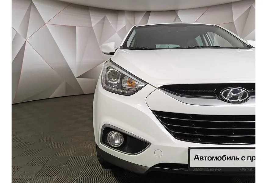 Hyundai ix35 2.0 AT (150 л.с.) Travel Белый в АВИЛОН. Слайд №10