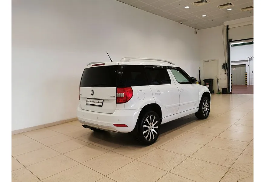 Skoda Yeti 1.4 TSI DSG (122 л.с.) Active Белый в АВИЛОН. Слайд №2