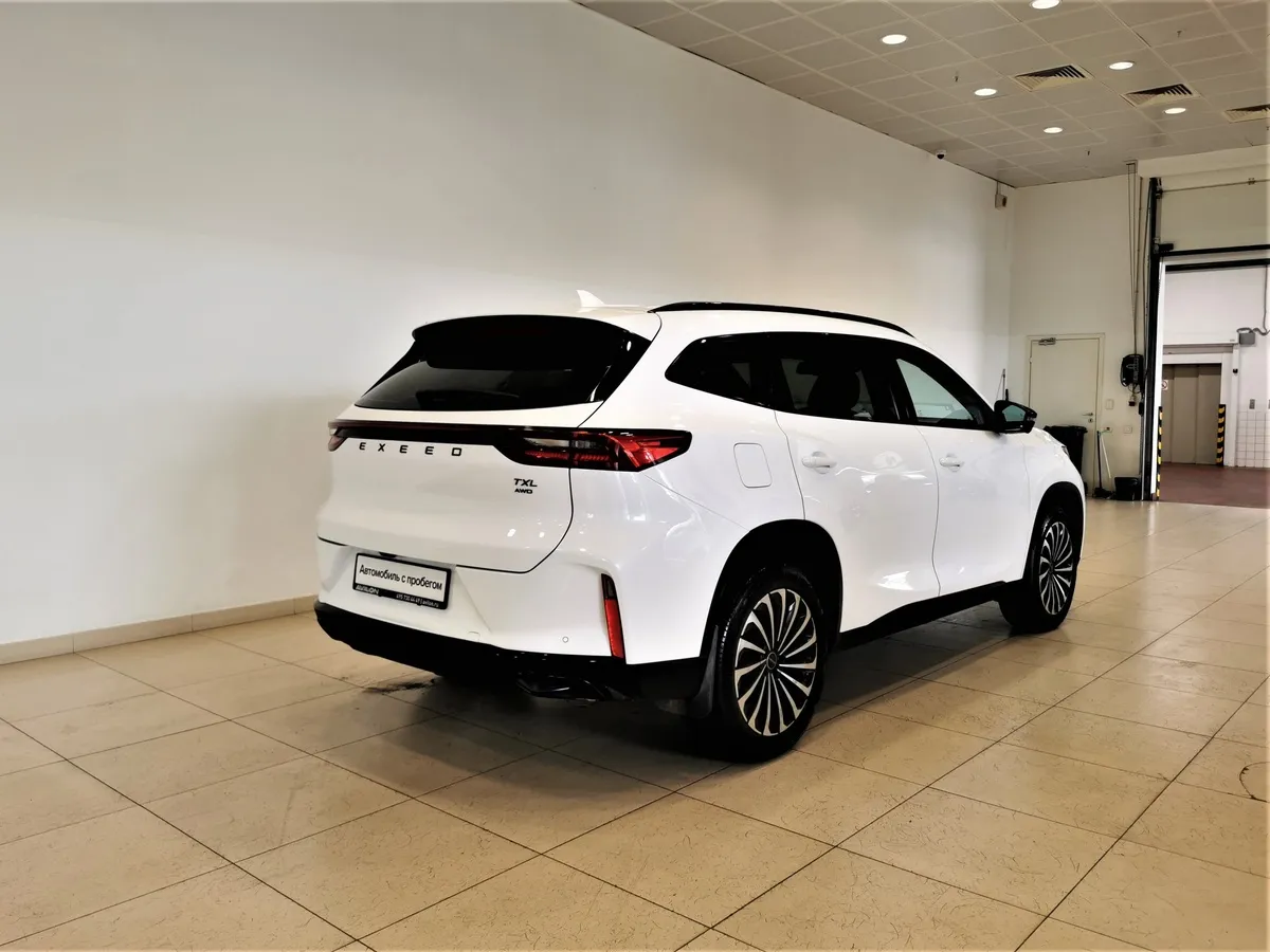 EXEED TXL 1.6 TGDI DCT7 AWD (186 л.с.) Белый в АВИЛОН. Слайд №2