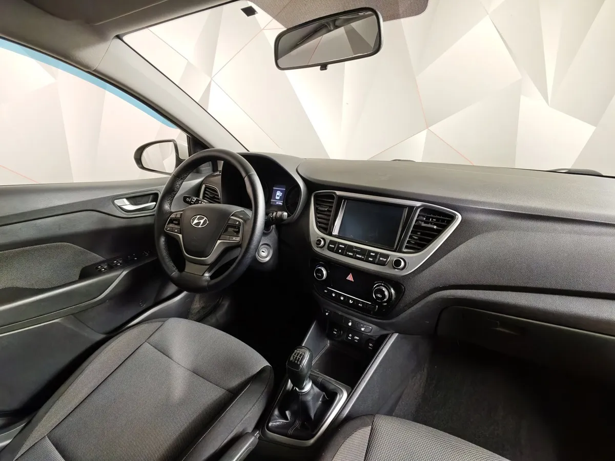 Hyundai Solaris 1.6 MT (123 л.с.) Elegance Белый в АВИЛОН. Слайд №13