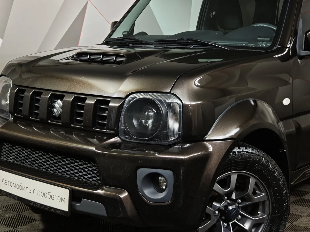 Suzuki Jimny 1.3 AT 4WD (85 л.с.) Коричневый в АВИЛОН. Слайд №10