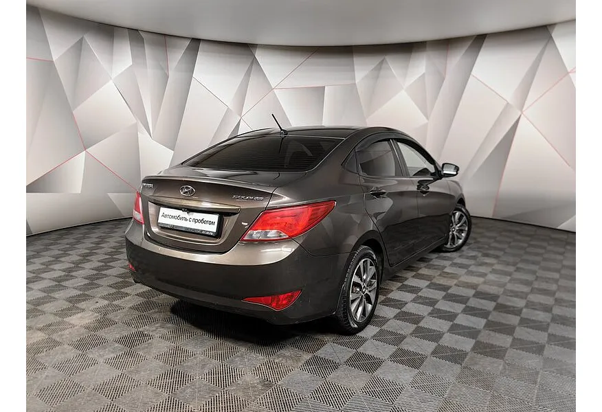 Hyundai Solaris 1.6 AT (123 л.с.) Super Series Коричневый в АВИЛОН. Слайд №2