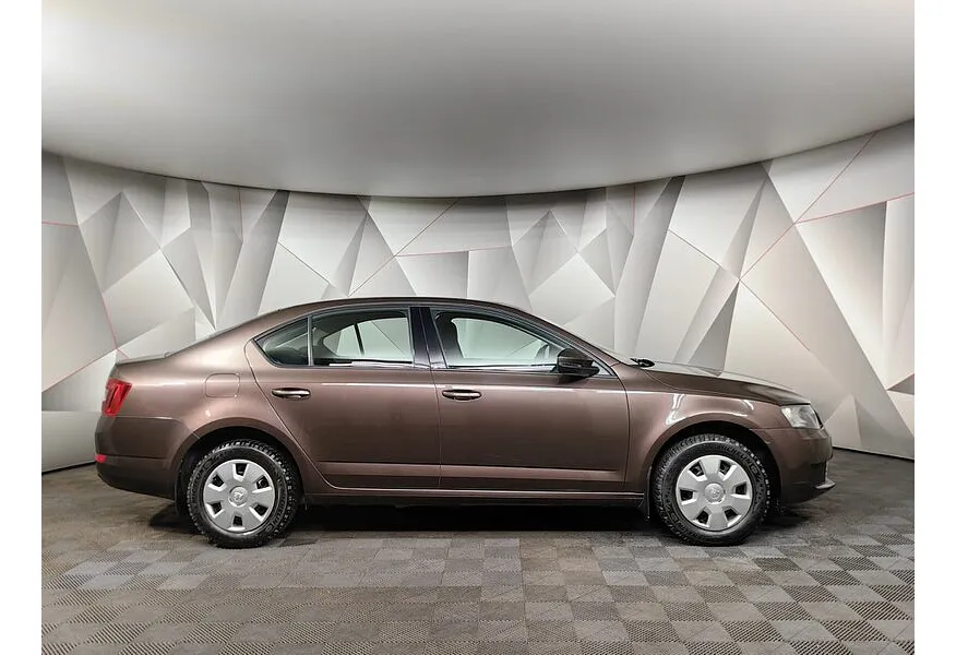 Skoda Octavia 1.6 MPI MT (110 л.с.) Коричневый в АВИЛОН. Слайд №6