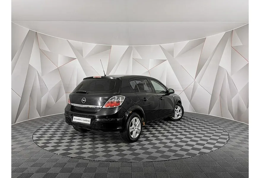 Opel Astra 1.8 AT (140 л.с.) Черный в АВИЛОН. Слайд №2