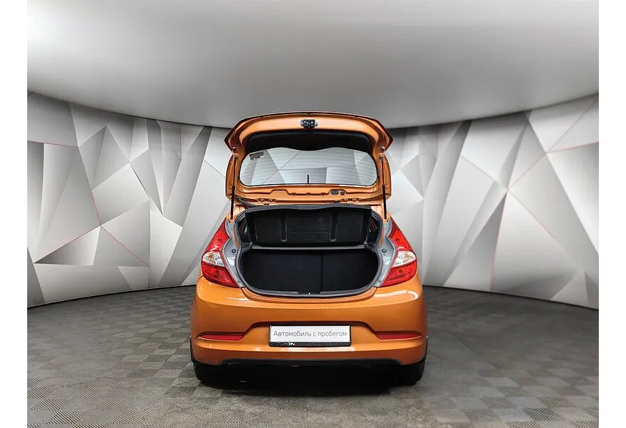 Hyundai Solaris 1.6 MT (123 л.с.) Comfort Оранжевый в АВИЛОН. Слайд №12 Hyundai Solaris 1.6 MT (123 л.с.) Comfort Оранжевый в АВИЛОН. Слайд №12