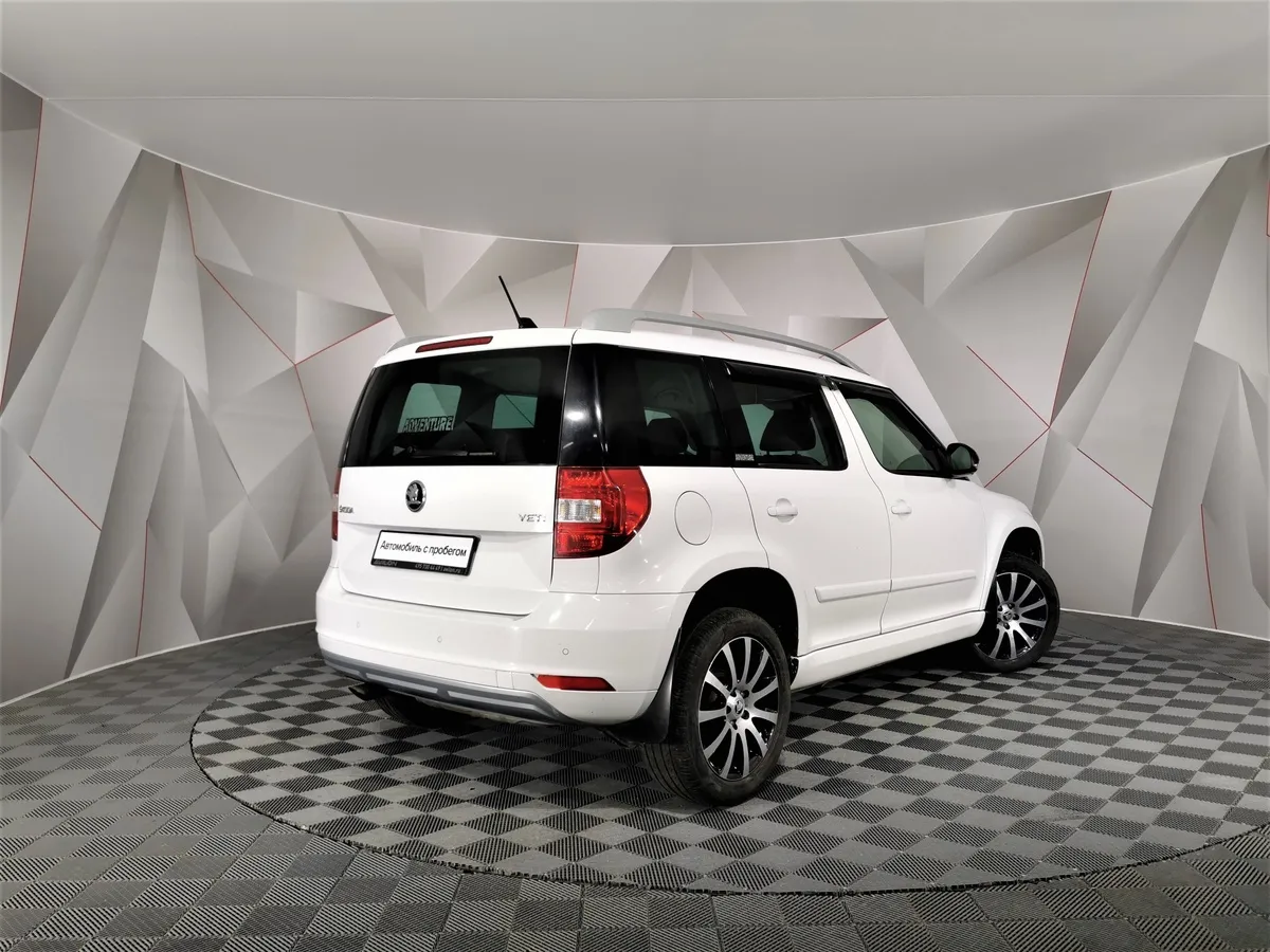 Skoda Yeti 1.6 AT (110 л.с.) Белый в АВИЛОН. Слайд №2