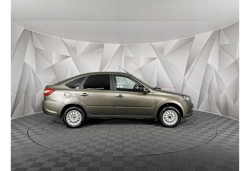 ВАЗ (Lada) Granta 1.6 MT 16 кл (106 л.с.) Коричневый в АВИЛОН. Слайд №6