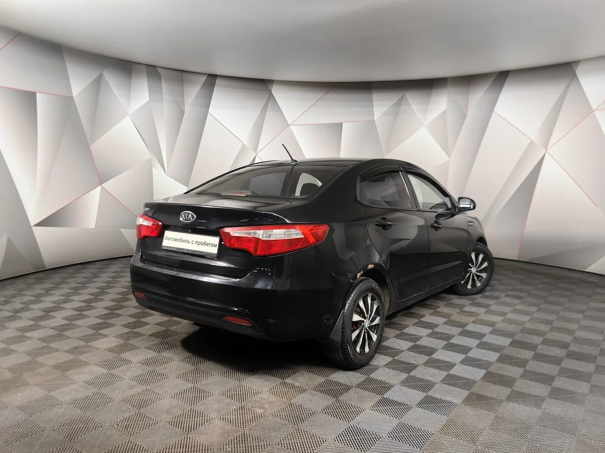 Kia Rio 1.4 MT (107 л.с.) Comfort Черный в АВИЛОН. Слайд №2
