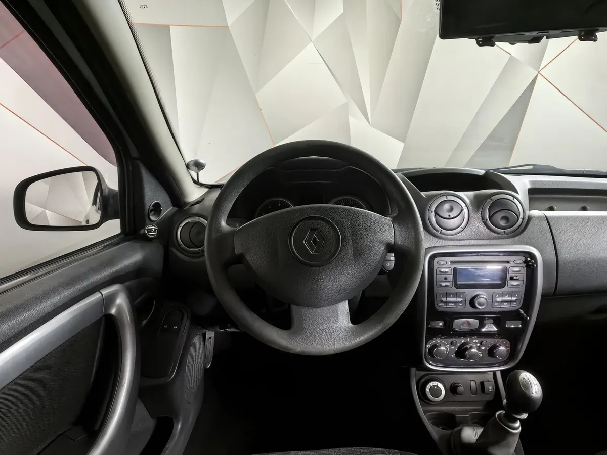Renault Duster 2.0 MT 4x4 (143 л.с.) Белый в АВИЛОН. Слайд №17