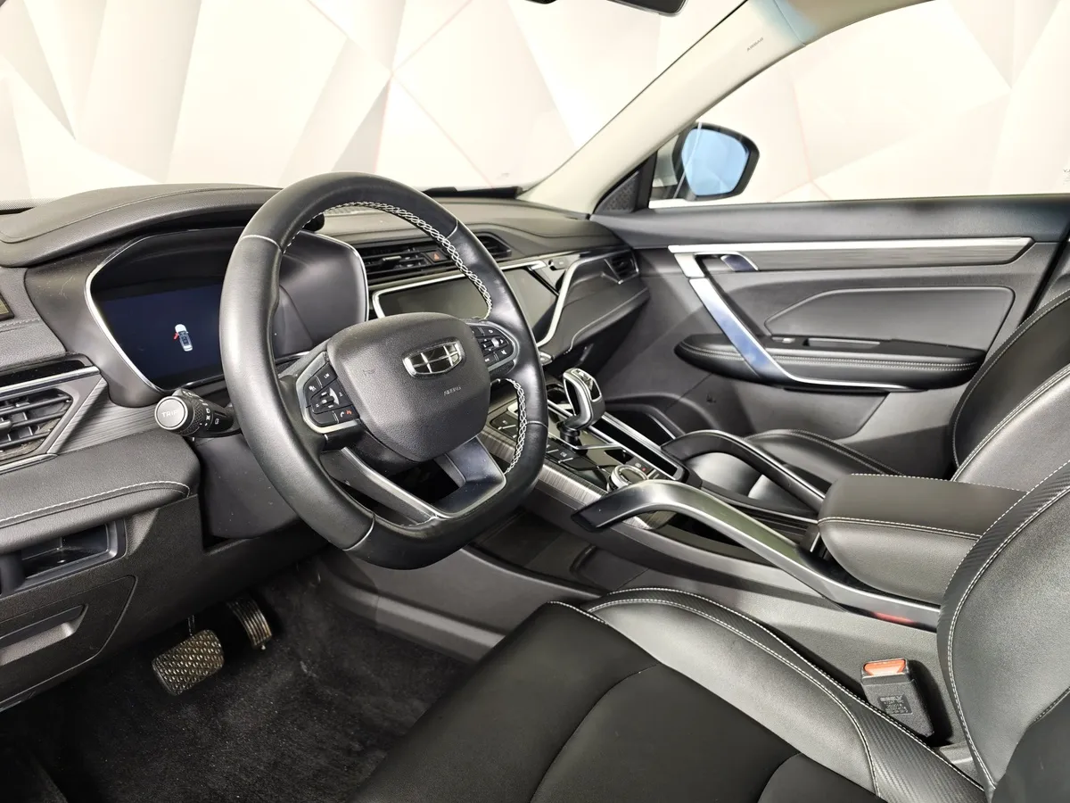Geely Atlas Pro 1.5T 7DCT AWD (177 л.с.) Flagship+ Серый в АВИЛОН. Слайд №19