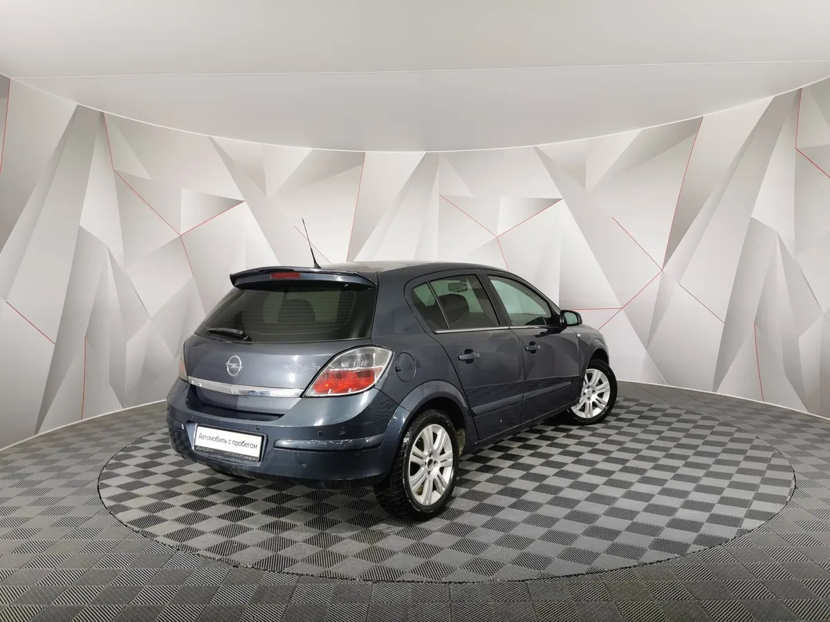 Opel Astra 1.6 MT (105 л.с.) Серый в АВИЛОН. Слайд №2
