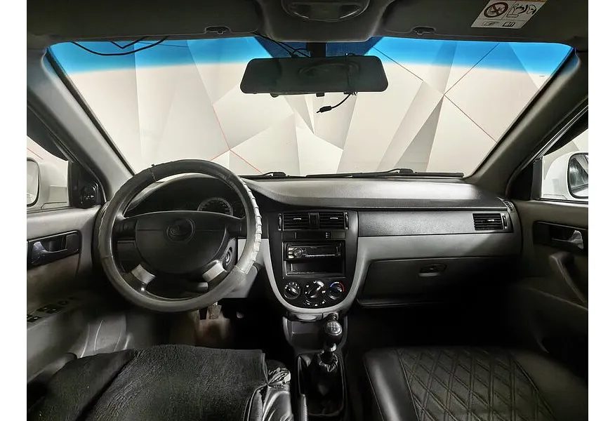 Daewoo Gentra 1.5 MT (107 л.с.) Белый в АВИЛОН. Слайд №10