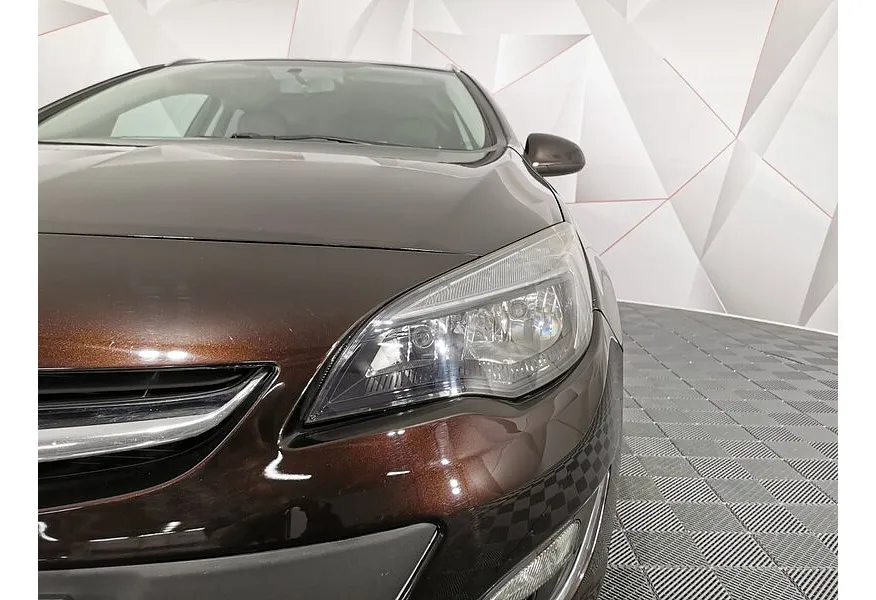 Opel Astra 1.4 Turbo AT (140 л.с.) Коричневый в АВИЛОН. Слайд №10
