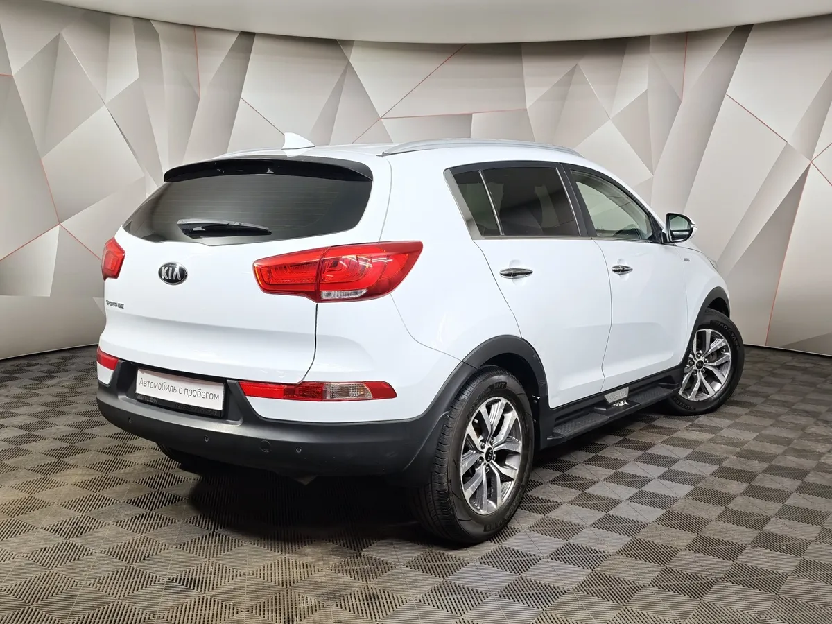 Kia Sportage 2.0 AT 4WD (150 л.с.) Luxe Белый в АВИЛОН. Слайд №2