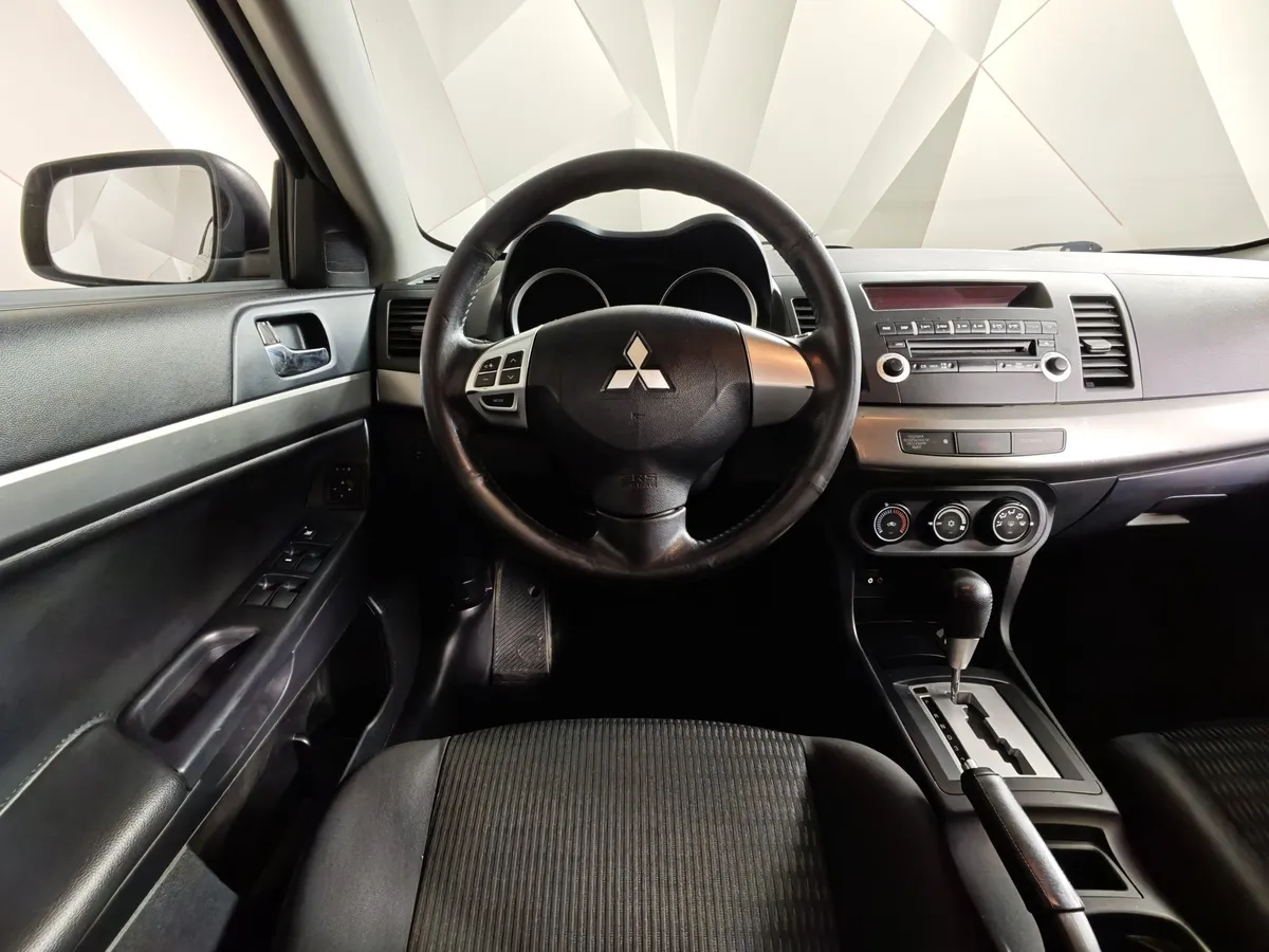 Mitsubishi Lancer 1.6 AT (117 л.с.) Серый в АВИЛОН. Слайд №20