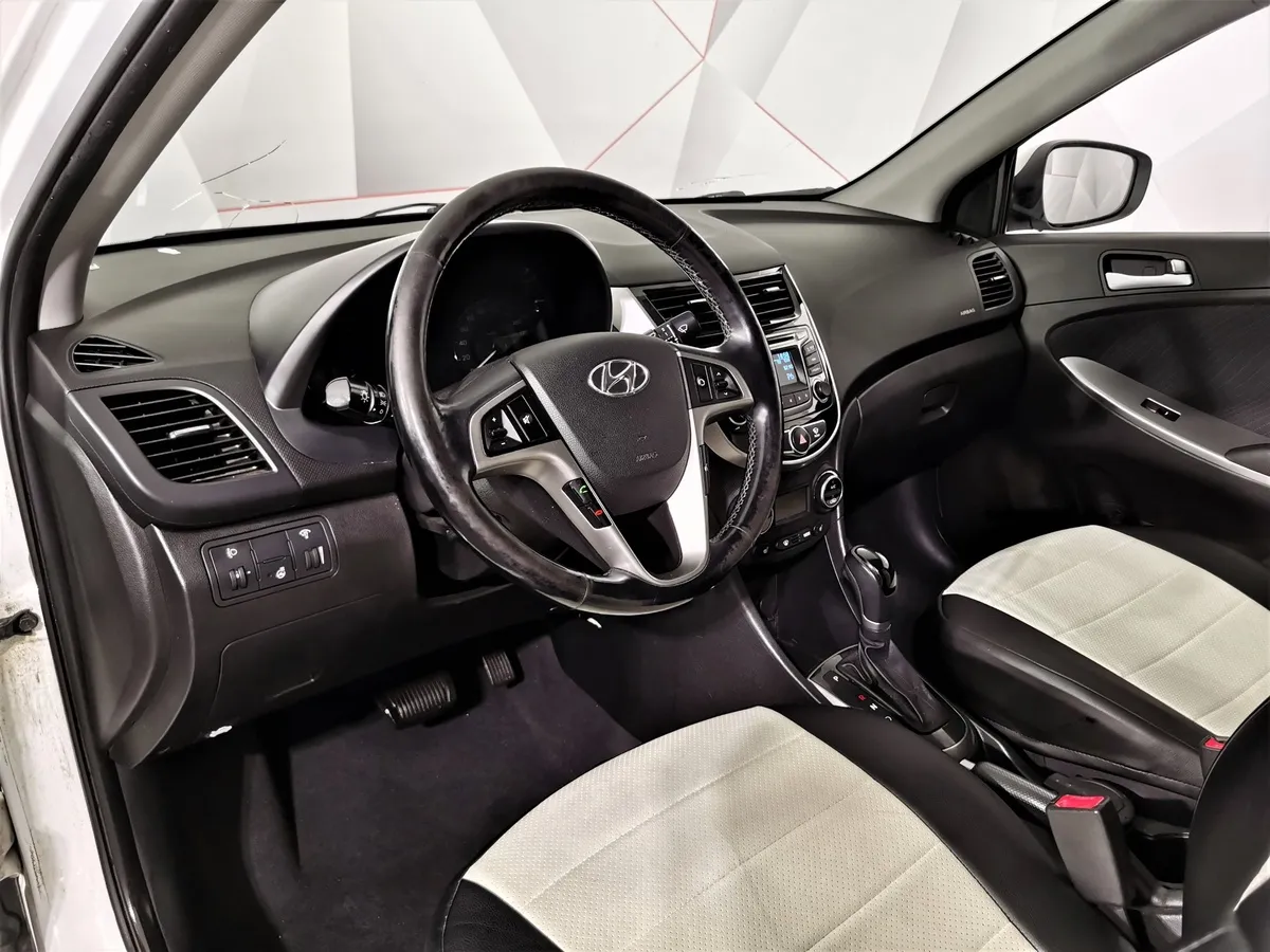 Hyundai Solaris 1.6 AT (123 л.с.) Optima Белый в АВИЛОН. Слайд №17