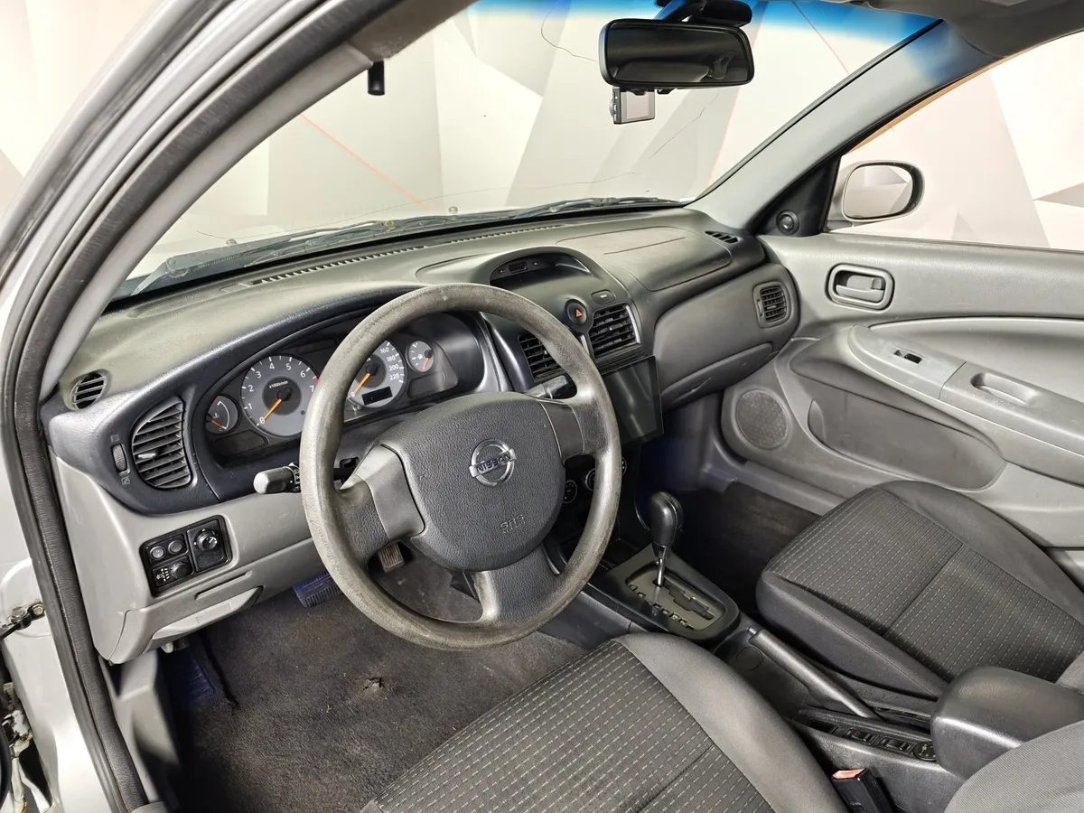 Nissan Almera Classic 1.6 AT (107 л.с.) Серебристый в АВИЛОН. Слайд №15
