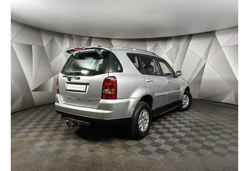 SsangYong Rexton 2.7 Xdi AT AWD (165 л.с.) Серебристый в АВИЛОН. Слайд №2