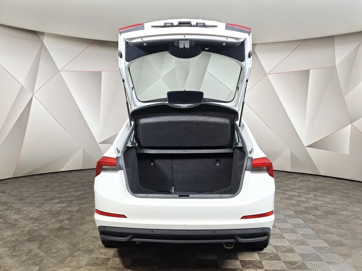 Skoda Rapid 1.6 AT (110 л.с.) Белый в АВИЛОН. Слайд №12