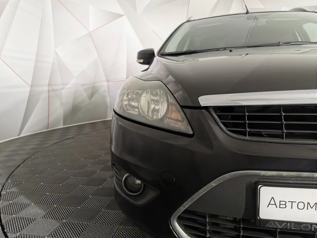 Ford Focus 2.0 AT (145 л.с.) Ghia Черный в АВИЛОН. Слайд №10