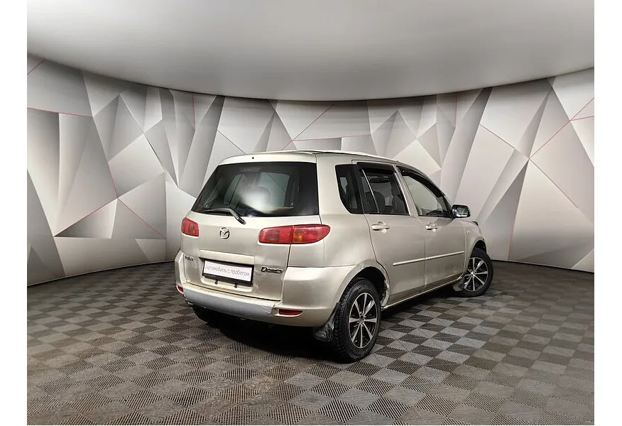 Mazda Demio 1.5 AT (113 л.с.) Серый в АВИЛОН. Слайд №2