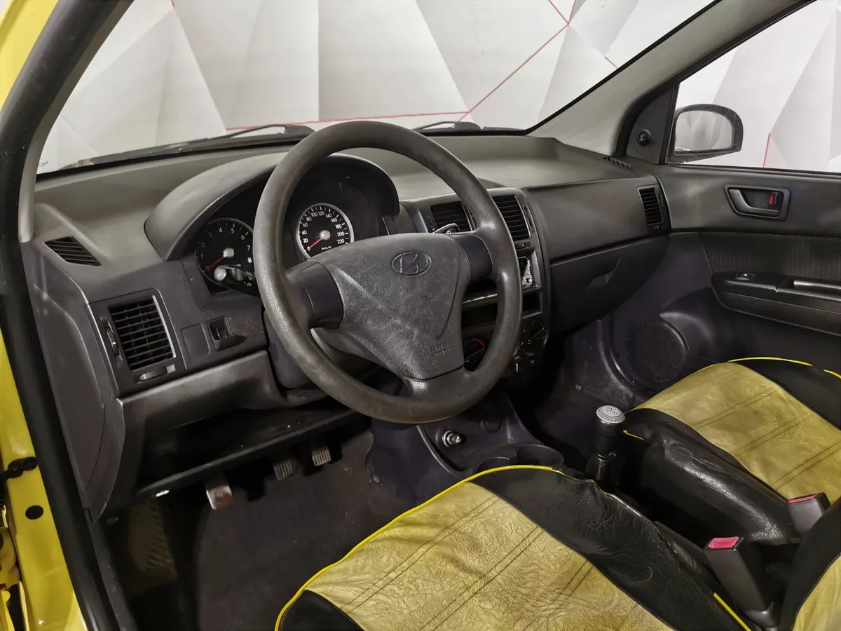 Hyundai Getz 1.4 MT (97 л.с.) Желтый в АВИЛОН. Слайд №16