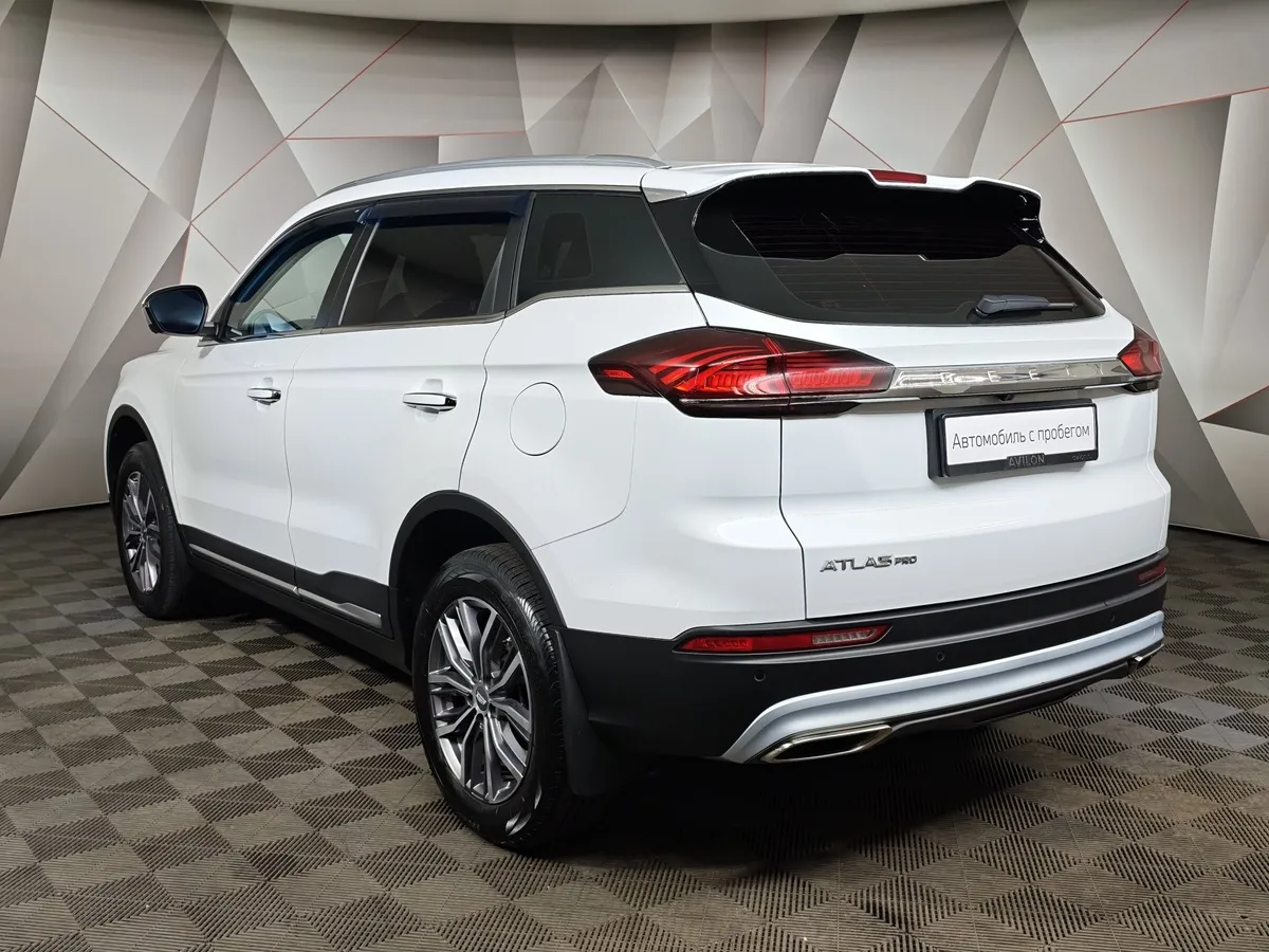 Geely Atlas Pro 1.5T AT FWD (177 л.с.) Luxury Белый в АВИЛОН. Слайд №4