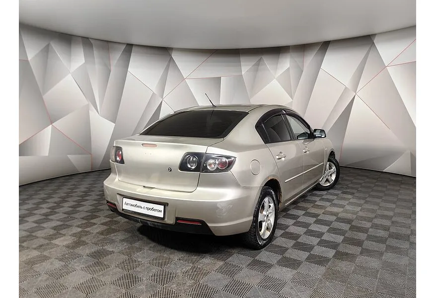 Mazda 3 1.6 AT (105 л.с.) Серый в АВИЛОН. Слайд №2