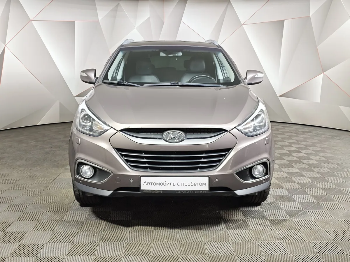 Hyundai ix35 2.0 AT 4WD (150 л.с.) Travel Коричневый в АВИЛОН. Слайд №7