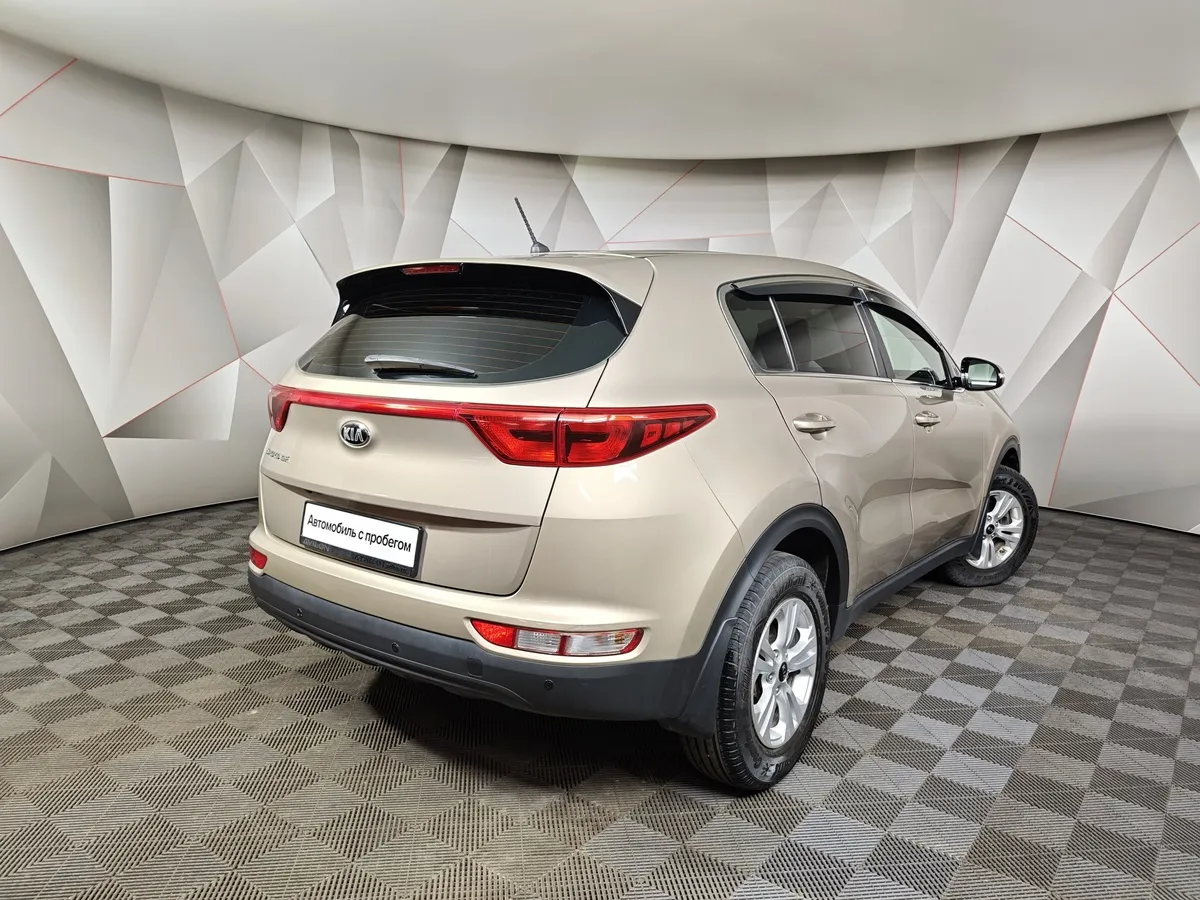 Kia Sportage 2.0 MT (150 л.с.) Classic Коричневый в АВИЛОН. Слайд №2