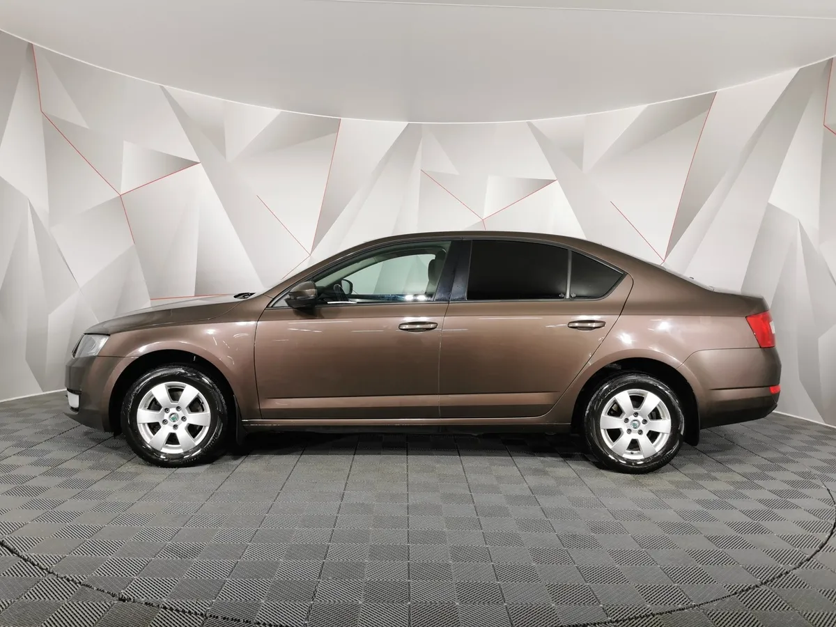 Skoda Octavia 1.6 MPI AT (110 л.с.) Коричневый в АВИЛОН. Слайд №5