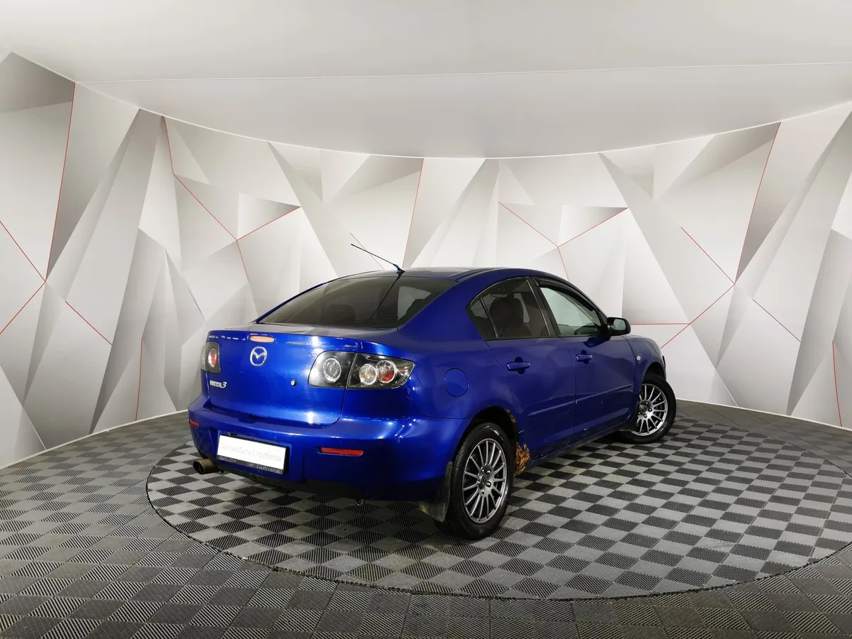 Mazda 3 1.6 MT (105 л.с.) Синий в АВИЛОН. Слайд №2