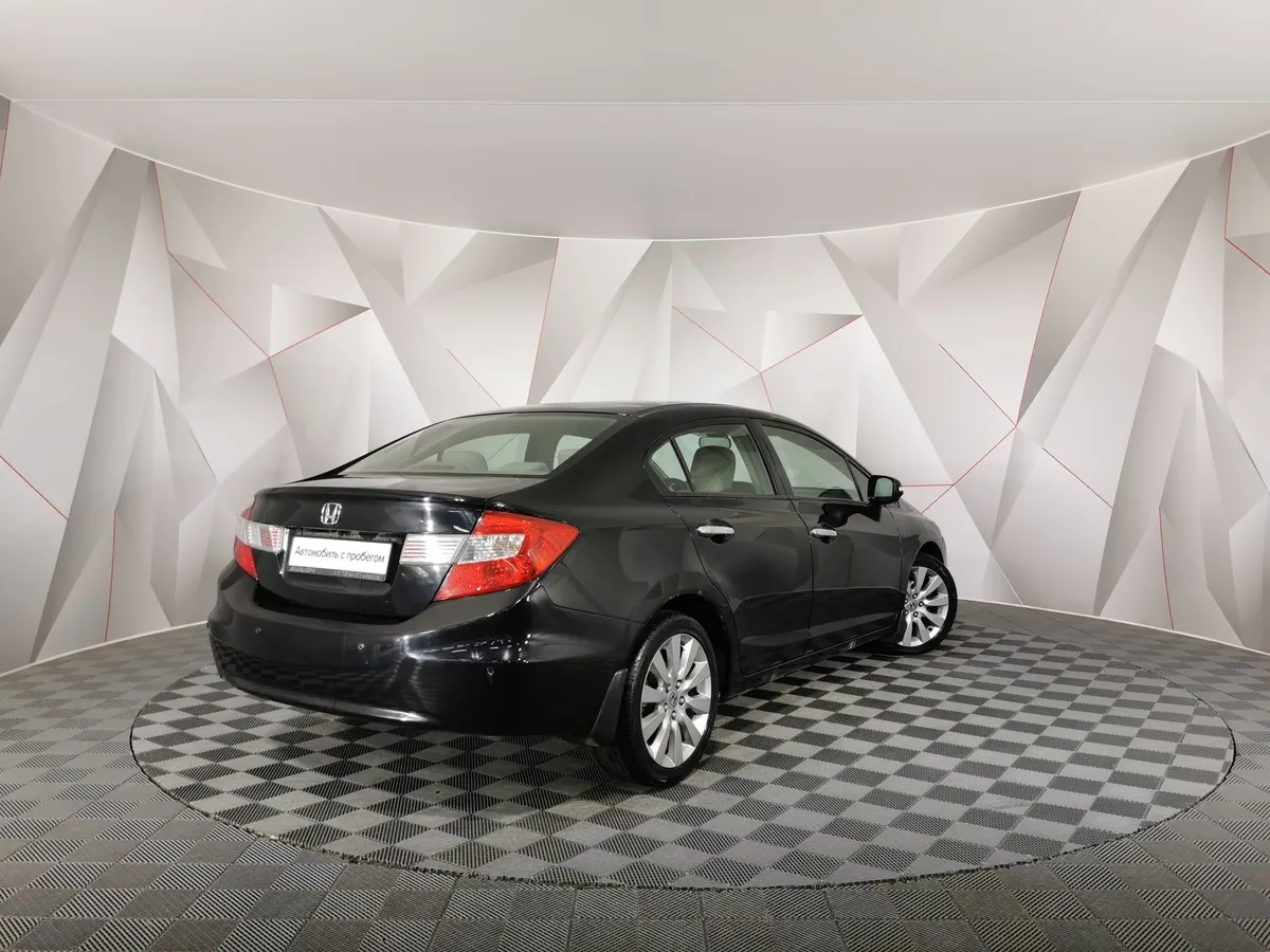Honda Civic 1.8 AT (142 л.с.) Черный в АВИЛОН. Слайд №2