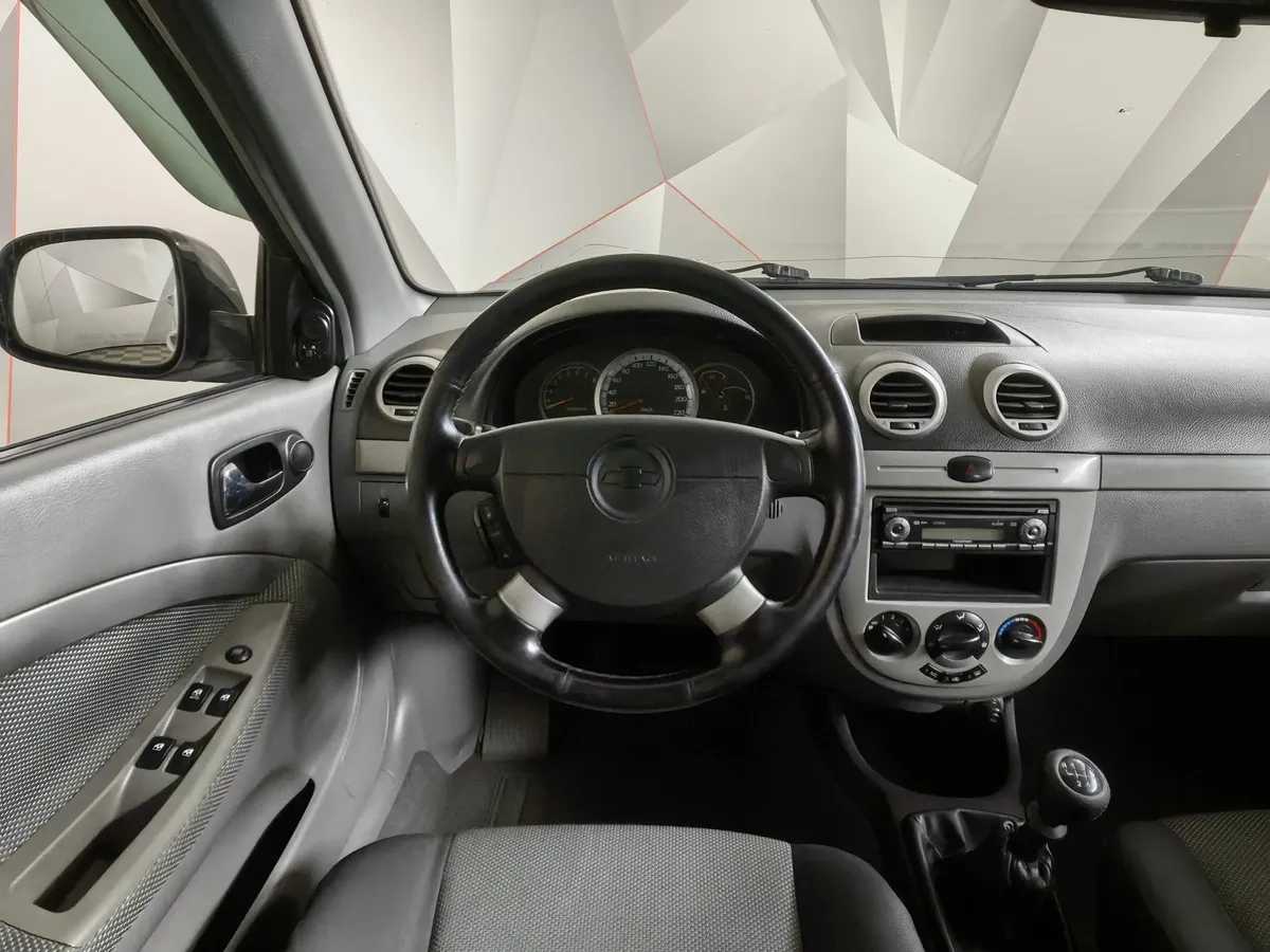 Chevrolet Lacetti 1.4 MT (95 л.с.) Серебристый в АВИЛОН. Слайд №17