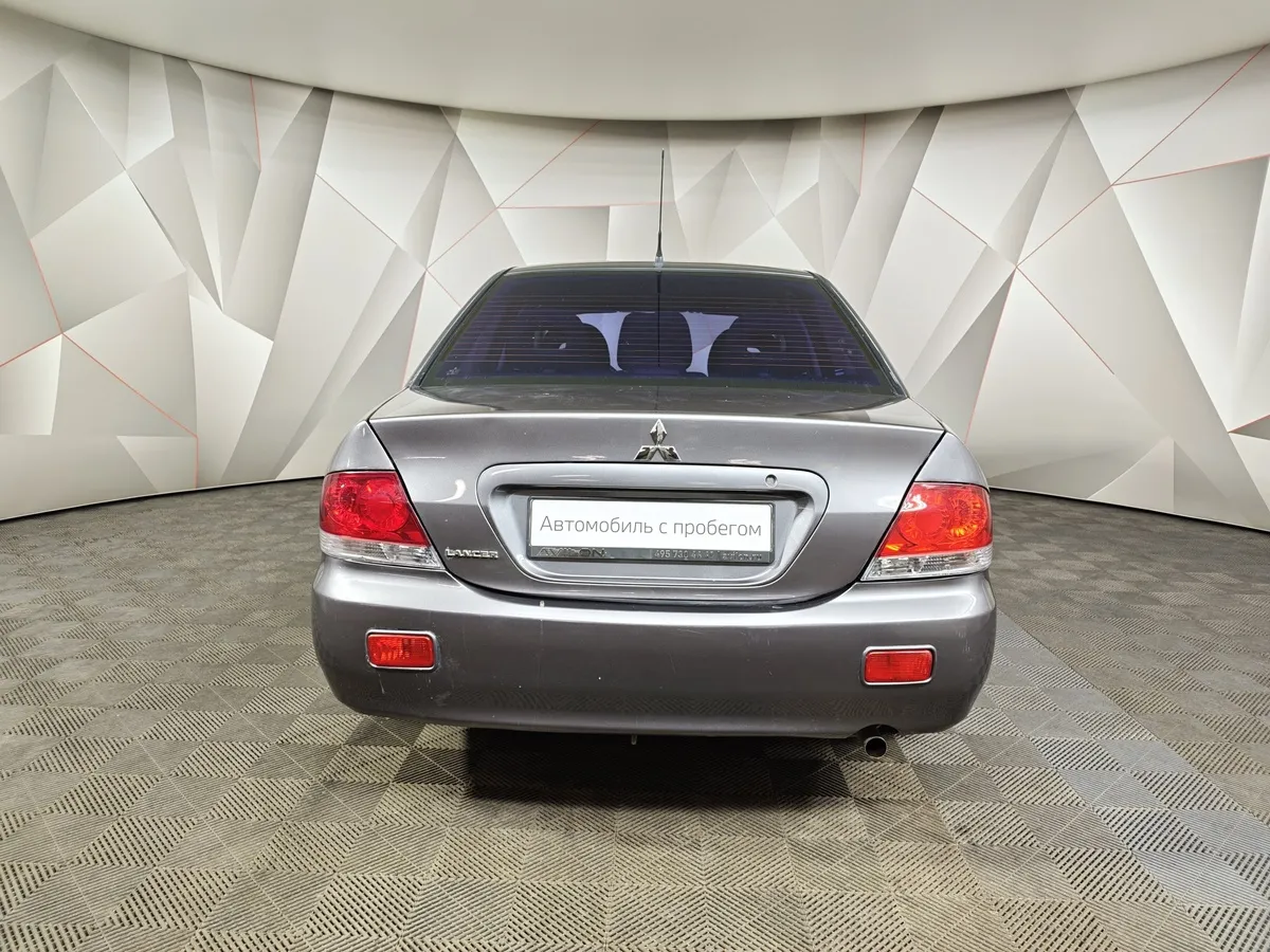 Mitsubishi Lancer 1.6 MT (100 л.с.) Серый в АВИЛОН. Слайд №8