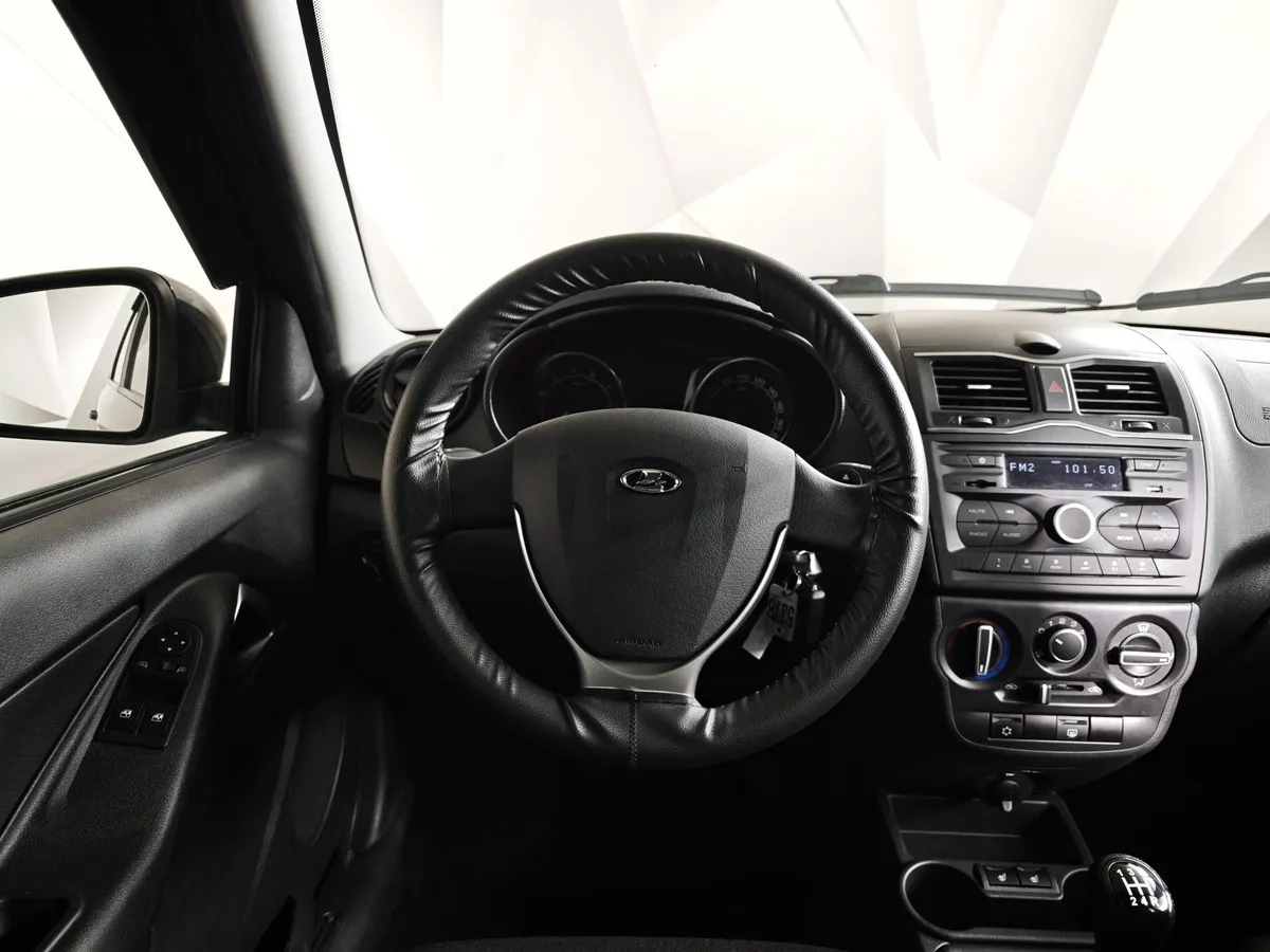 ВАЗ (Lada) Granta 1.6 MT 8кл (87 л.с.) Черный в АВИЛОН. Слайд №19