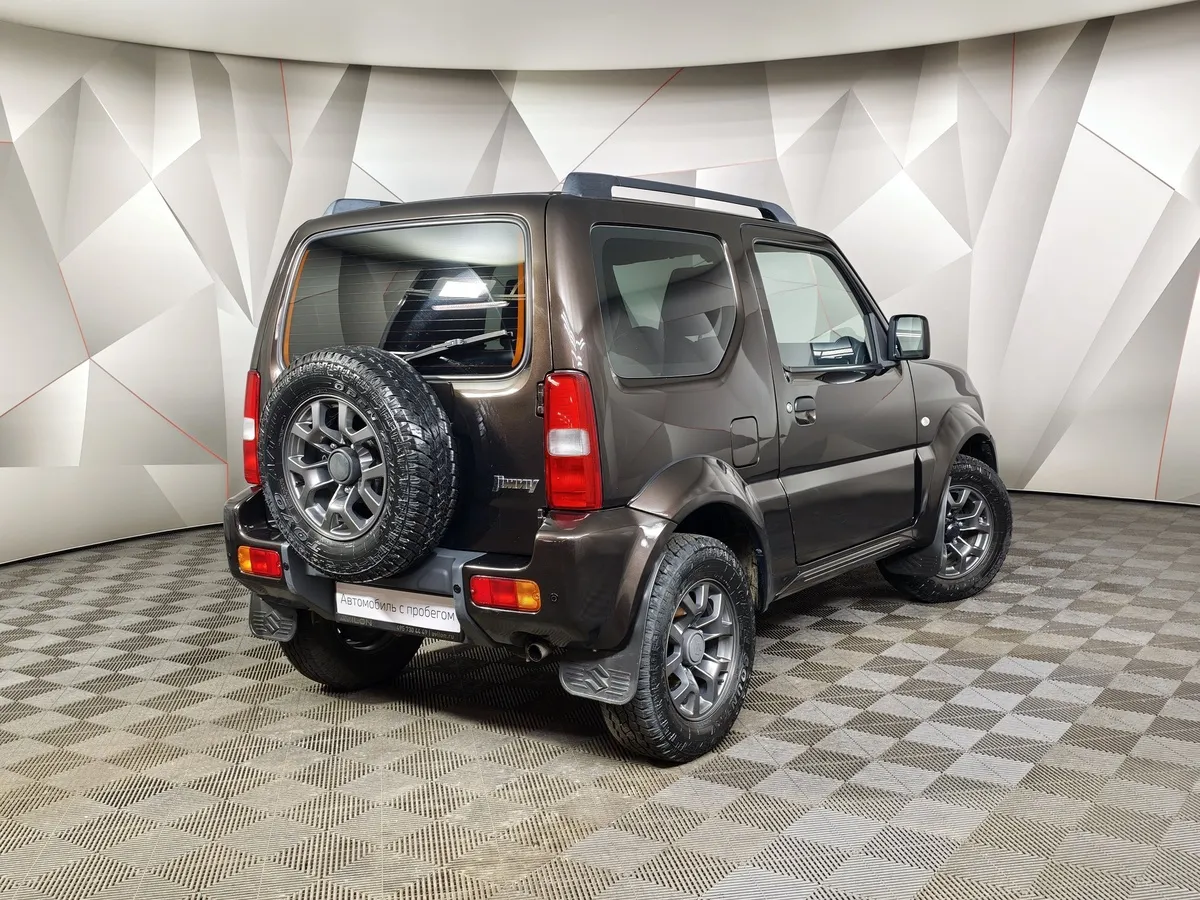 Suzuki Jimny 1.3 AT 4WD (85 л.с.) Коричневый в АВИЛОН. Слайд №2