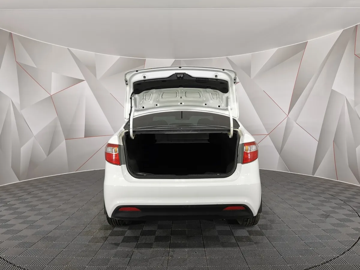 Kia Rio 1.6 AT (123 л.с.) Белый в АВИЛОН. Слайд №11