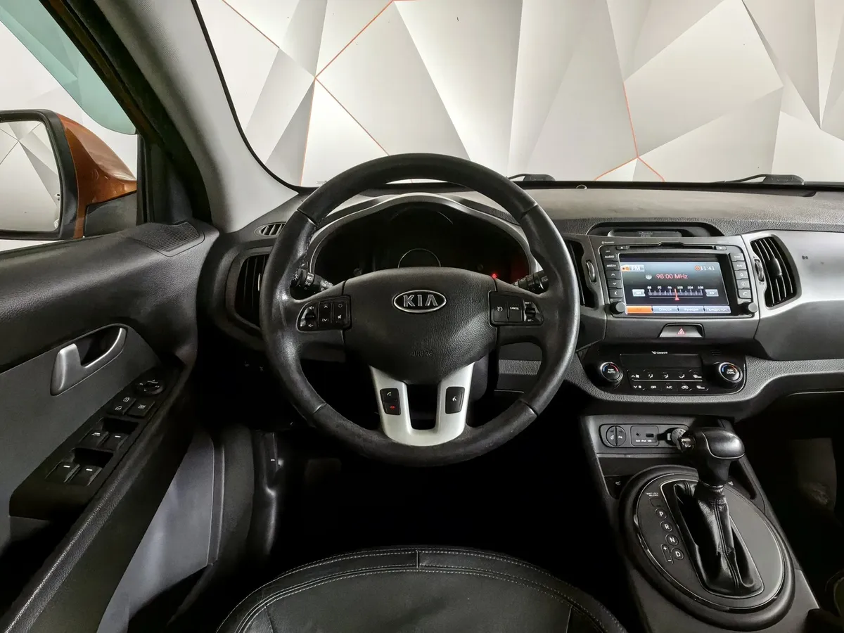 Kia Sportage 2.0 AT AWD (150 л.с.) Оранжевый в АВИЛОН. Слайд №19