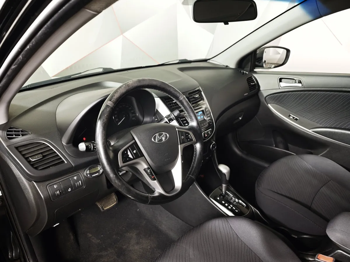 Hyundai Solaris 1.4 AT (107 л.с.) Style Черный в АВИЛОН. Слайд №18
