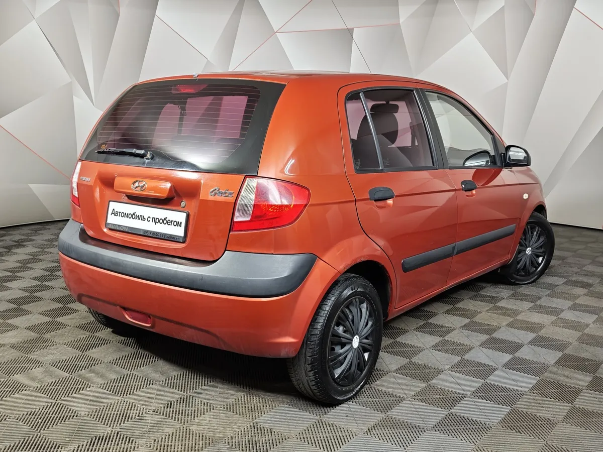 Hyundai Getz 1.4 MT (97 л.с.) Красный в АВИЛОН. Слайд №2