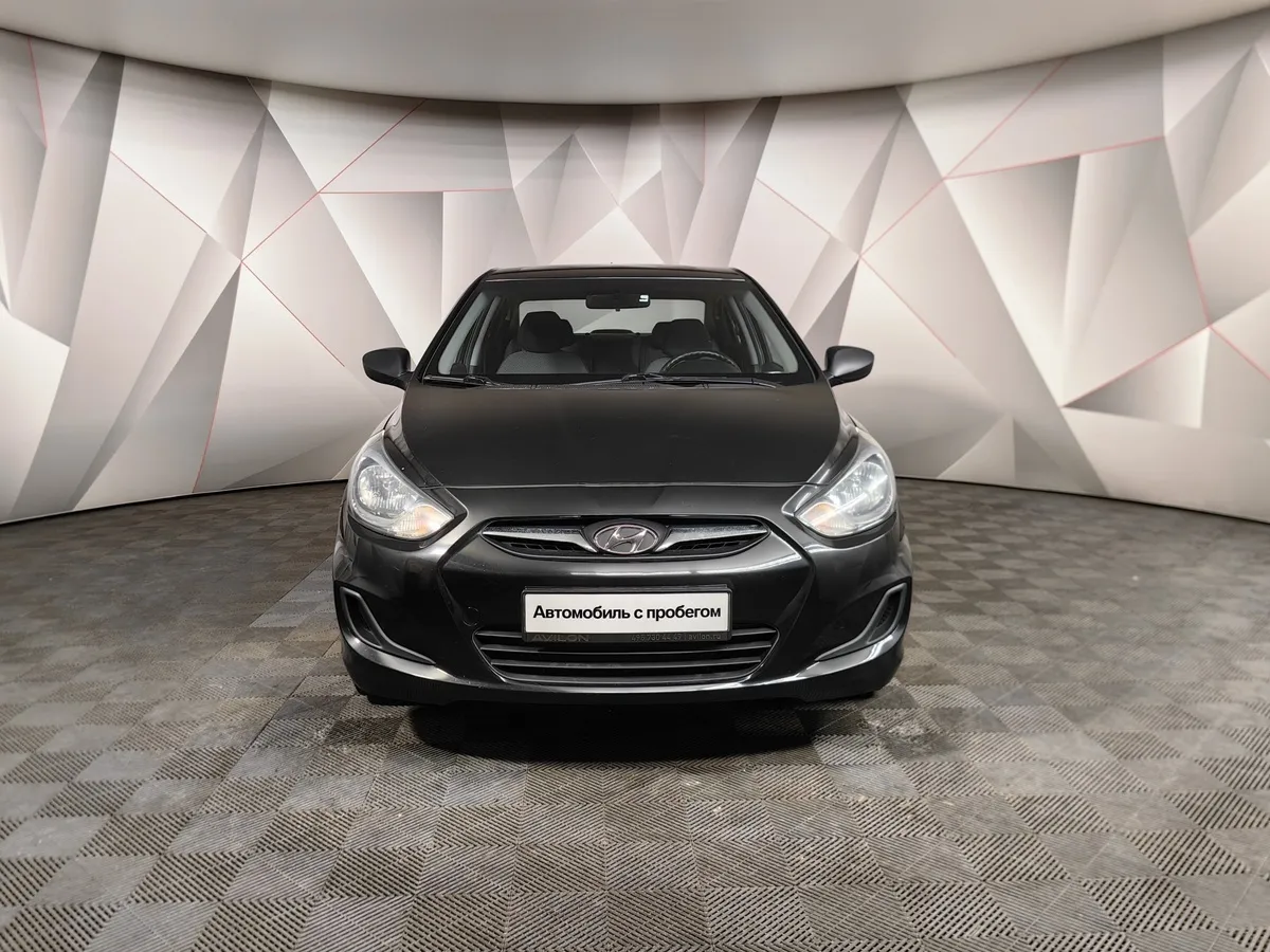 Hyundai Solaris 1.6 MT (123 л.с.) Optima Черный в АВИЛОН. Слайд №7