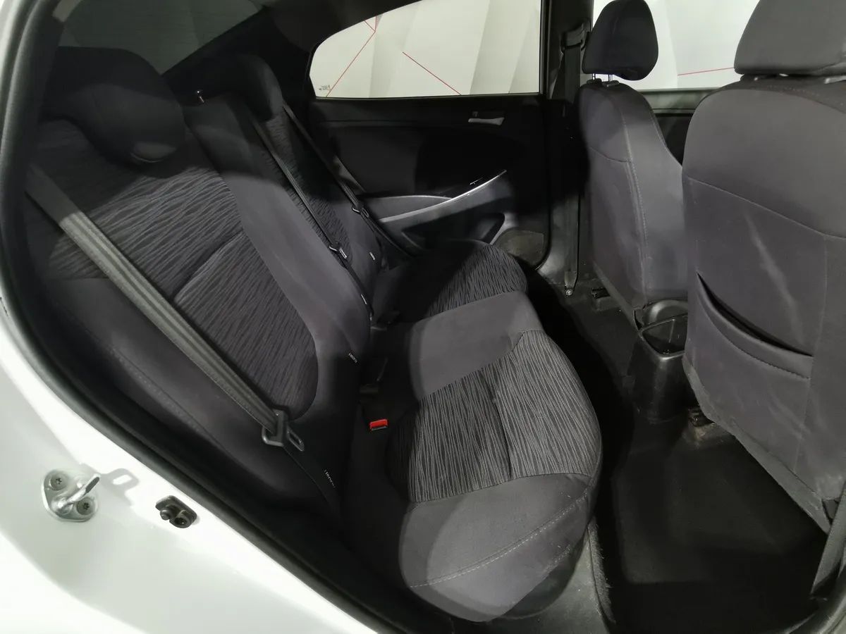 Hyundai Solaris 1.6 MT (123 л.с.) Белый в АВИЛОН. Слайд №15