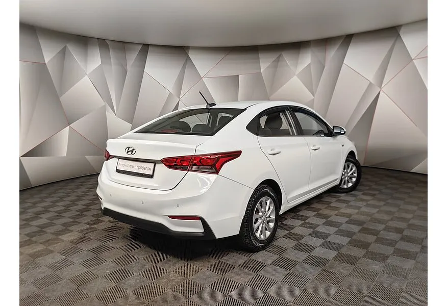 Hyundai Solaris 1.6 MT (123 л.с.) Comfort Белый в АВИЛОН. Слайд №2