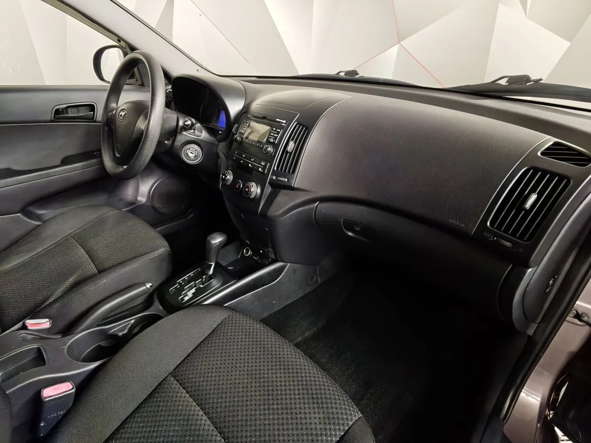 Hyundai i30 1.6 AT (126 л.с.) Коричневый в АВИЛОН. Слайд №11