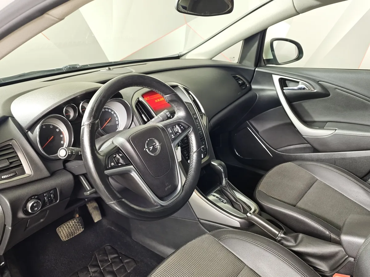 Opel Astra 1.6 AT (115 л.с.) Cosmo Белый в АВИЛОН. Слайд №15