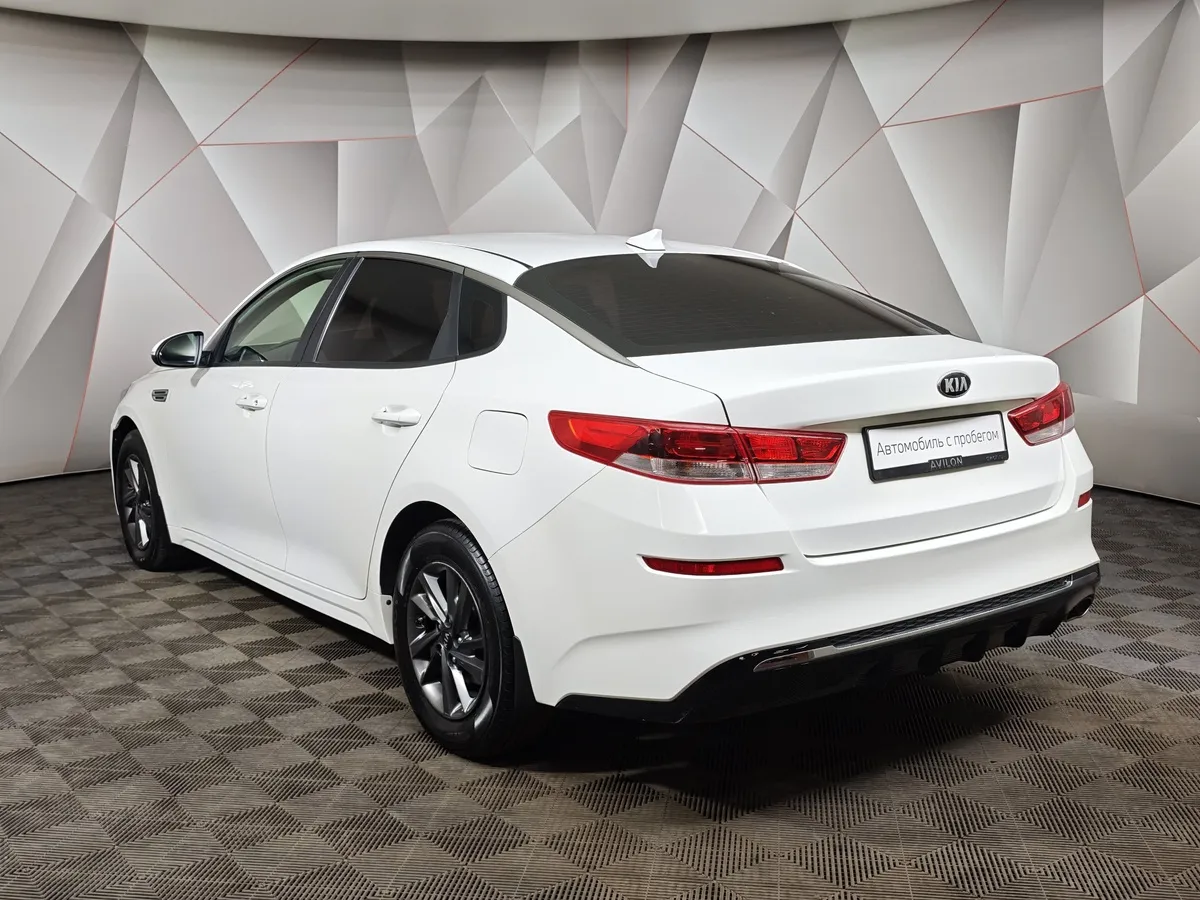 Kia Optima 2.0 AT (150 л.с.) Classic Белый в АВИЛОН. Слайд №4