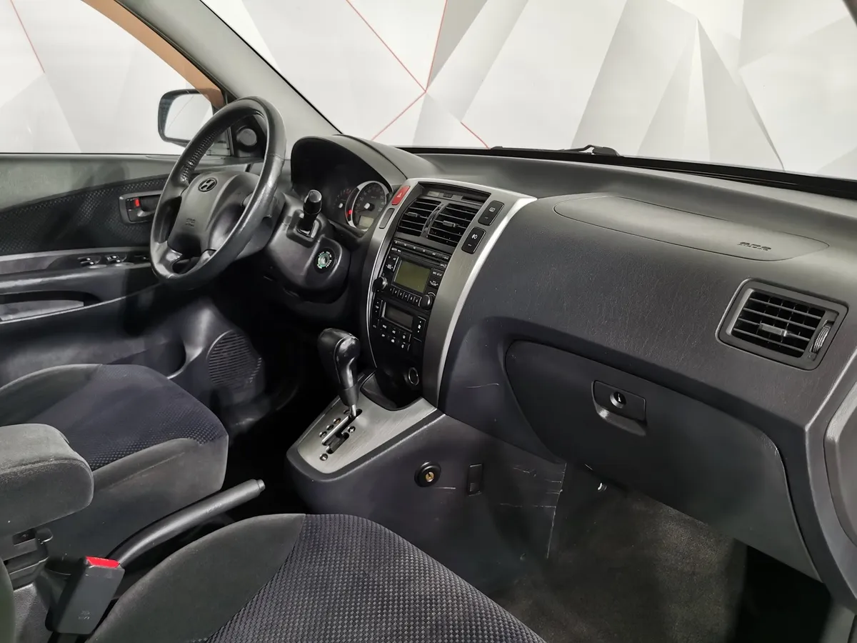 Hyundai Tucson 2.0 AT (150 л.с.) Черный в АВИЛОН. Слайд №12